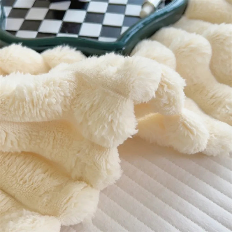 Close-up of the fluffy off-white faux rabbit fur pile
